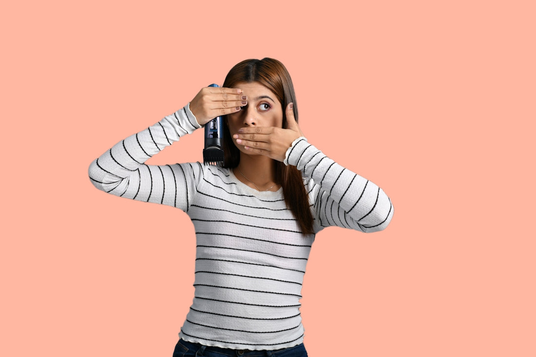 a person holding a telephone to the ear